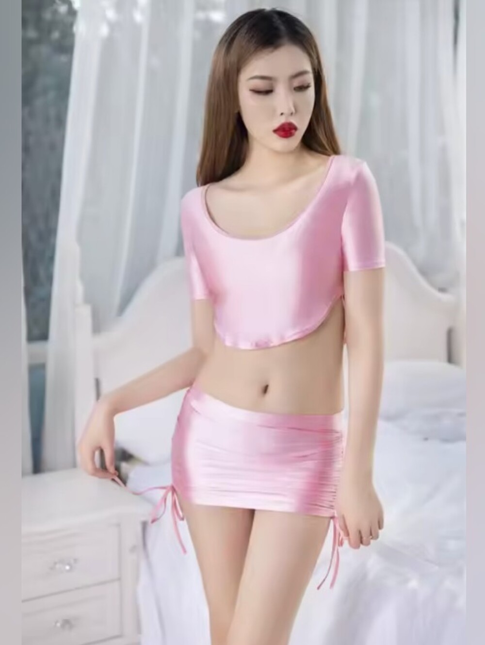 Pink top and skirt set.